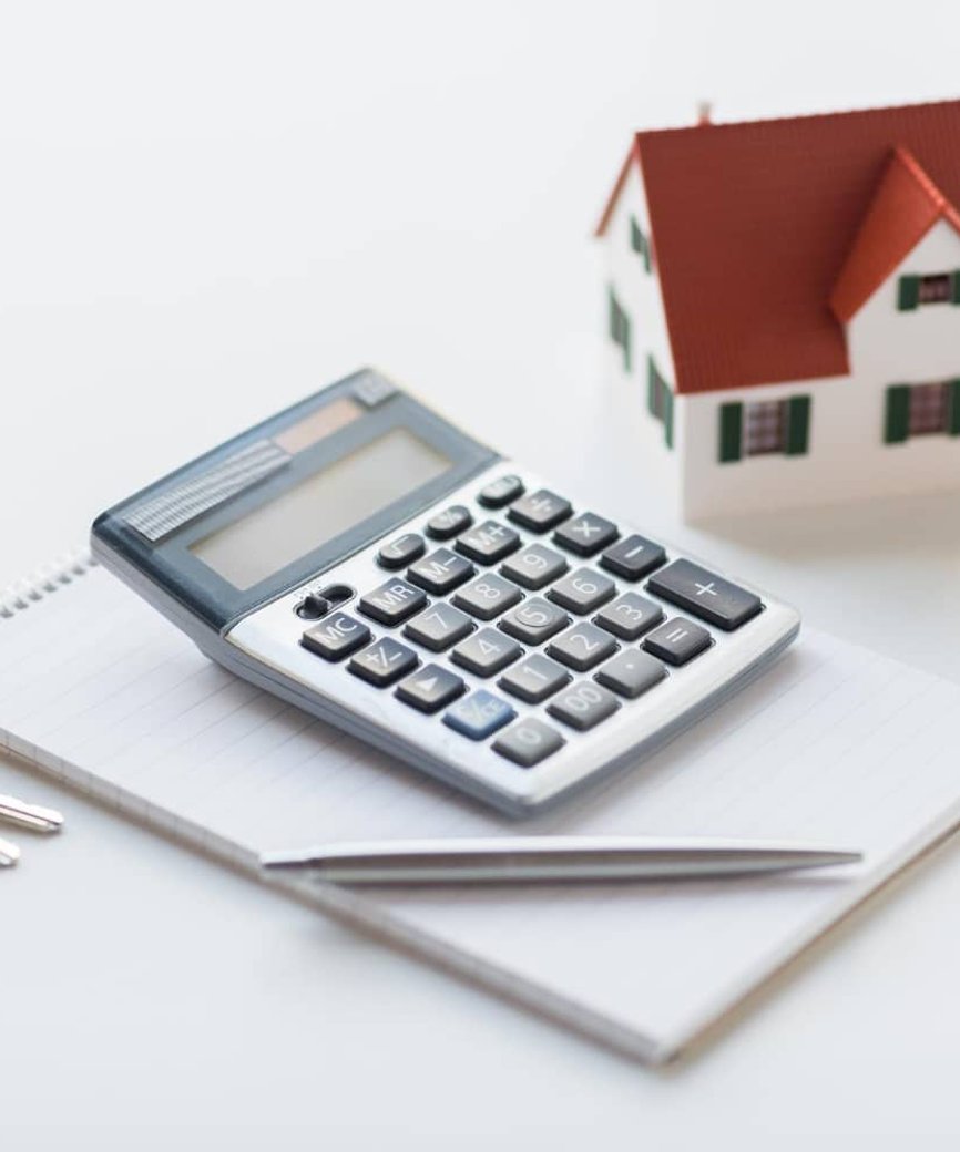 homebuyer calculating a monthly mortgage payment
